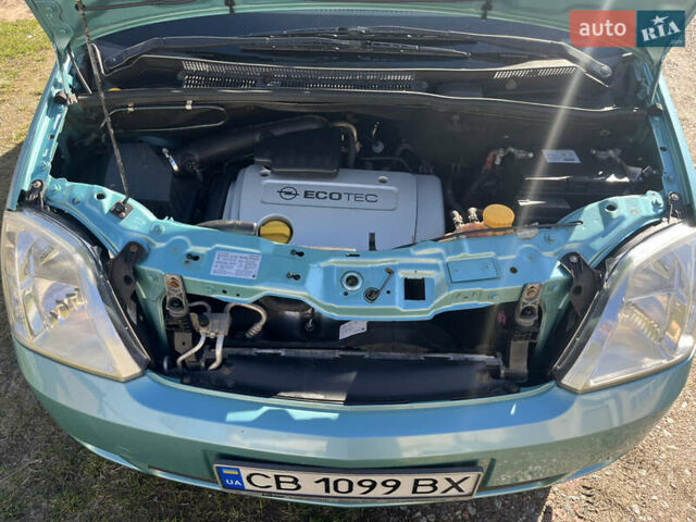 Зеленый Опель Мерива, объемом двигателя 1.6 л и пробегом 170 тыс. км за 2900 $, фото 7 на Automoto.ua