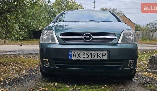 Зеленый Опель Мерива, объемом двигателя 1.6 л и пробегом 320 тыс. км за 5500 $, фото 3 на Automoto.ua