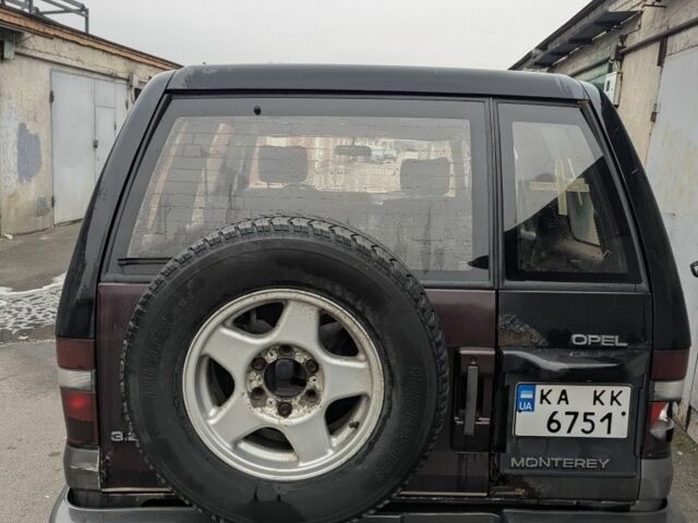 Черный Опель Монтерей, объемом двигателя 3.2 л и пробегом 211 тыс. км за 1000 $, фото 4 на Automoto.ua