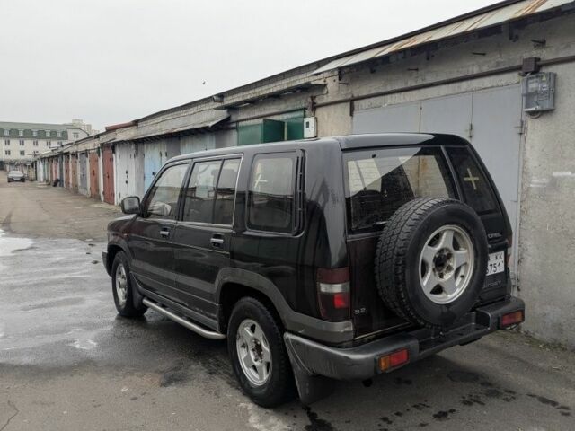 Черный Опель Монтерей, объемом двигателя 3.2 л и пробегом 211 тыс. км за 1000 $, фото 2 на Automoto.ua