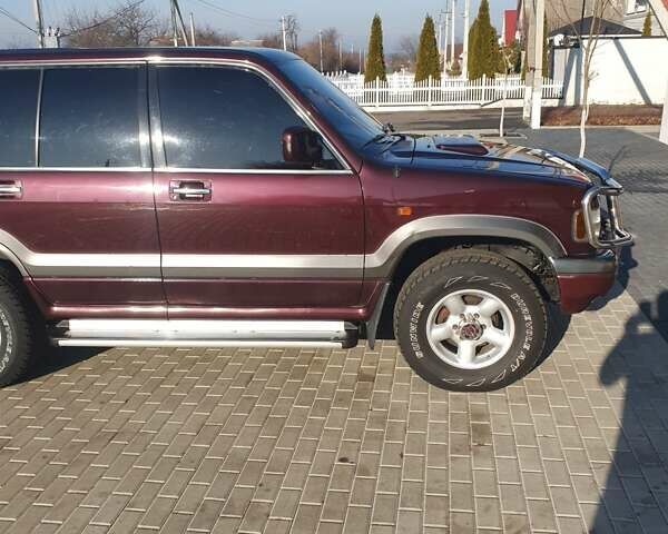 Червоний Опель Монтерей, об'ємом двигуна 3.1 л та пробігом 250 тис. км за 9000 $, фото 1 на Automoto.ua