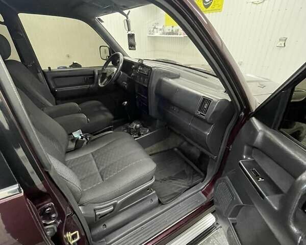 Червоний Опель Монтерей, об'ємом двигуна 3.1 л та пробігом 250 тис. км за 9000 $, фото 21 на Automoto.ua