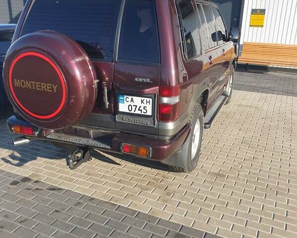 Червоний Опель Монтерей, об'ємом двигуна 3.1 л та пробігом 250 тис. км за 9000 $, фото 6 на Automoto.ua