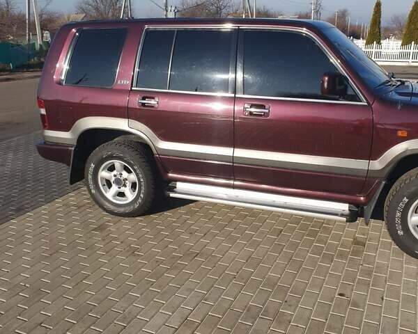 Червоний Опель Монтерей, об'ємом двигуна 3.1 л та пробігом 250 тис. км за 9000 $, фото 5 на Automoto.ua