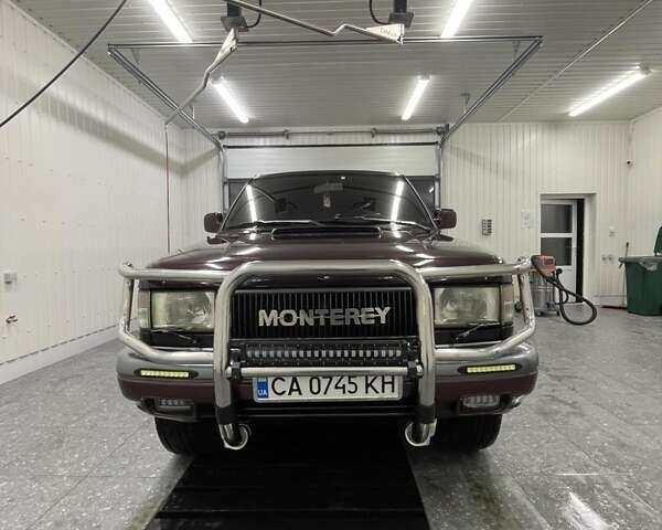 Червоний Опель Монтерей, об'ємом двигуна 3.1 л та пробігом 250 тис. км за 9000 $, фото 19 на Automoto.ua