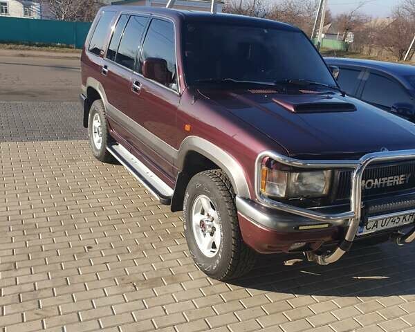 Червоний Опель Монтерей, об'ємом двигуна 3.1 л та пробігом 250 тис. км за 9000 $, фото 8 на Automoto.ua