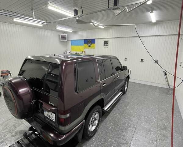 Червоний Опель Монтерей, об'ємом двигуна 3.1 л та пробігом 250 тис. км за 9000 $, фото 11 на Automoto.ua