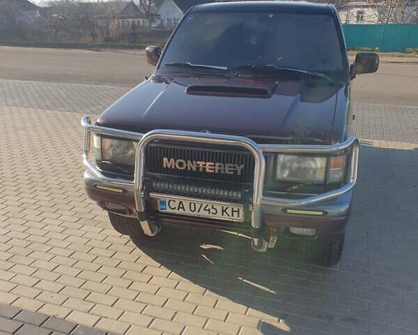 Червоний Опель Монтерей, об'ємом двигуна 3.1 л та пробігом 250 тис. км за 9000 $, фото 10 на Automoto.ua