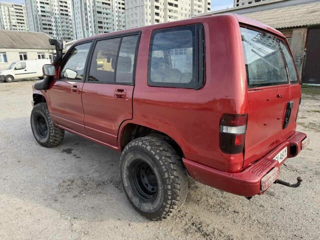 Красный Опель Монтерей, объемом двигателя 3.1 л и пробегом 266 тыс. км за 3000 $, фото 2 на Automoto.ua