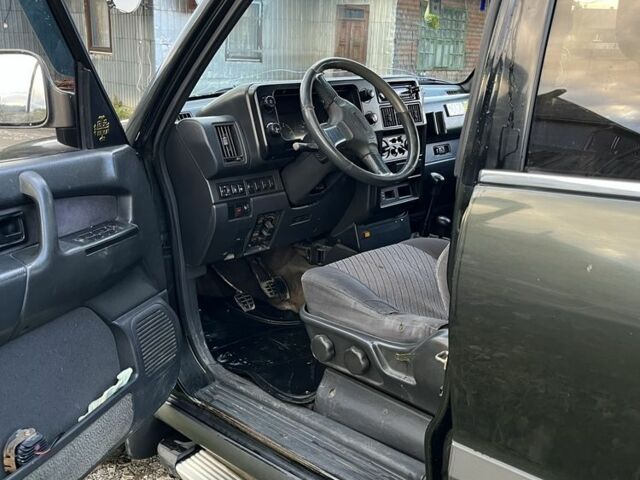 Зелений Опель Монтерей, об'ємом двигуна 3.1 л та пробігом 396 тис. км за 5300 $, фото 4 на Automoto.ua