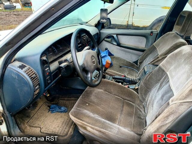 Білий Опель Омега, об'ємом двигуна 2 л та пробігом 200 тис. км за 500 $, фото 2 на Automoto.ua