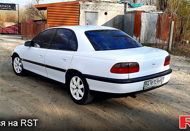 Білий Опель Омега, об'ємом двигуна 2 л та пробігом 200 тис. км за 2450 $, фото 4 на Automoto.ua
