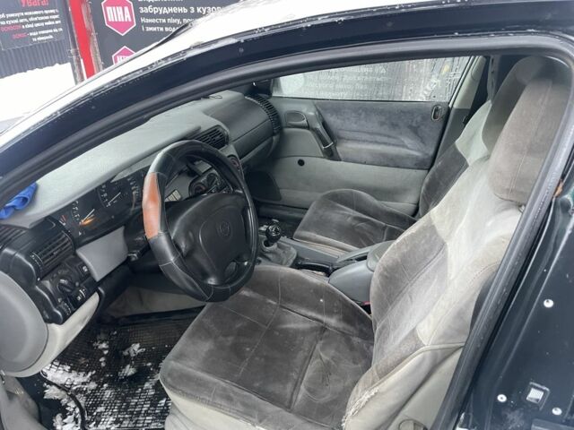 Білий Опель Омега, об'ємом двигуна 2 л та пробігом 300 тис. км за 1092 $, фото 7 на Automoto.ua