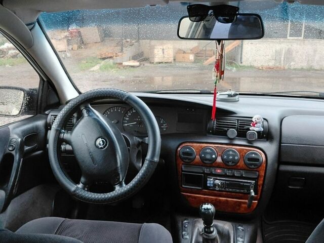 Білий Опель Омега, об'ємом двигуна 2 л та пробігом 229 тис. км за 1800 $, фото 33 на Automoto.ua