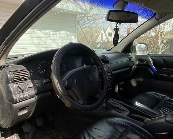 Белый Опель Омега, объемом двигателя 2 л и пробегом 450 тыс. км за 2200 $, фото 5 на Automoto.ua