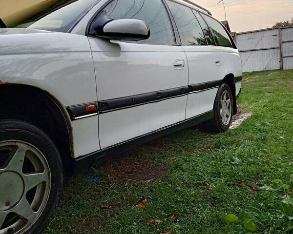 Белый Опель Омега, объемом двигателя 2.5 л и пробегом 368 тыс. км за 2000 $, фото 28 на Automoto.ua