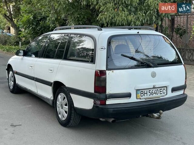 Білий Опель Омега, об'ємом двигуна 2.5 л та пробігом 250 тис. км за 1750 $, фото 4 на Automoto.ua