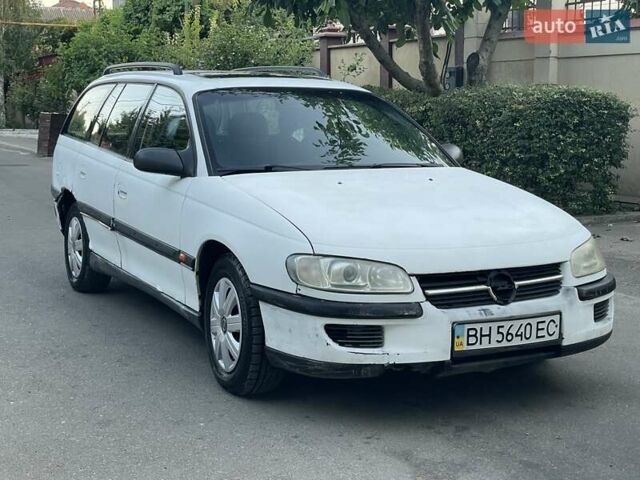 Білий Опель Омега, об'ємом двигуна 2.5 л та пробігом 250 тис. км за 1750 $, фото 3 на Automoto.ua