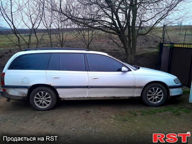 Білий Опель Омега, об'ємом двигуна 2 л та пробігом 300 тис. км за 1180 $, фото 4 на Automoto.ua