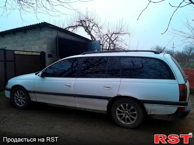 Білий Опель Омега, об'ємом двигуна 2 л та пробігом 300 тис. км за 1180 $, фото 2 на Automoto.ua