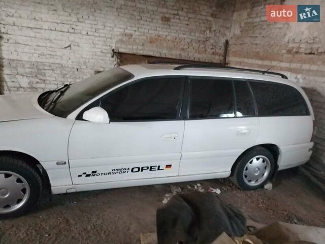 Білий Опель Омега, об'ємом двигуна 2.2 л та пробігом 250 тис. км за 1400 $, фото 3 на Automoto.ua