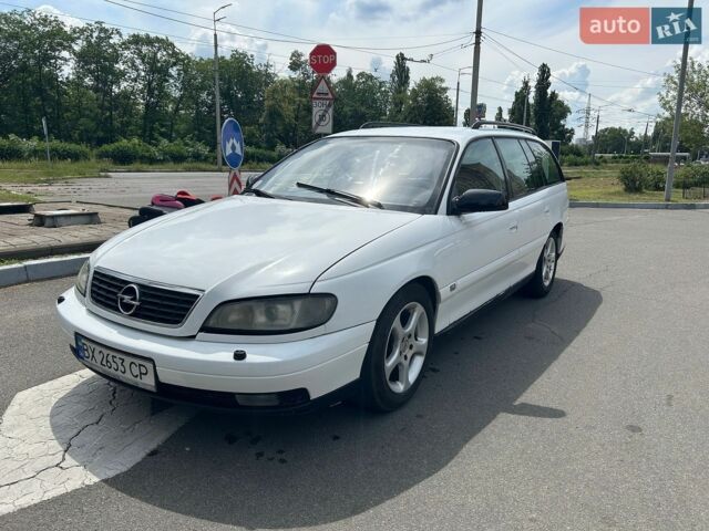 Белый Опель Омега, объемом двигателя 2.5 л и пробегом 385 тыс. км за 2999 $, фото 4 на Automoto.ua
