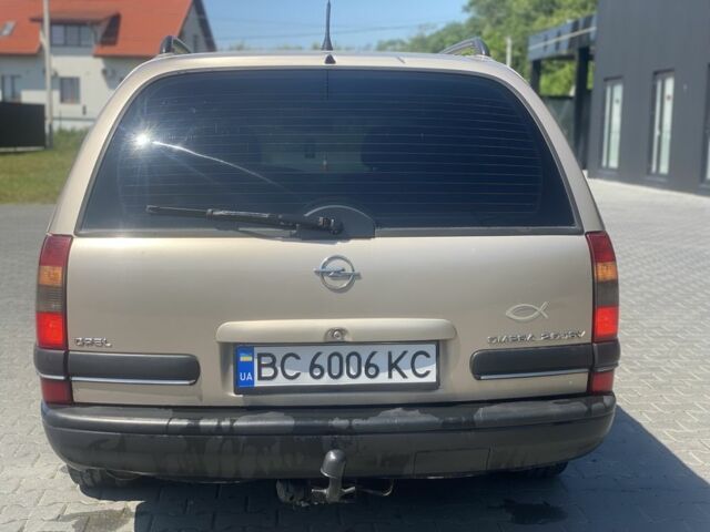 Бежевий Опель Омега, об'ємом двигуна 2 л та пробігом 354 тис. км за 2950 $, фото 6 на Automoto.ua