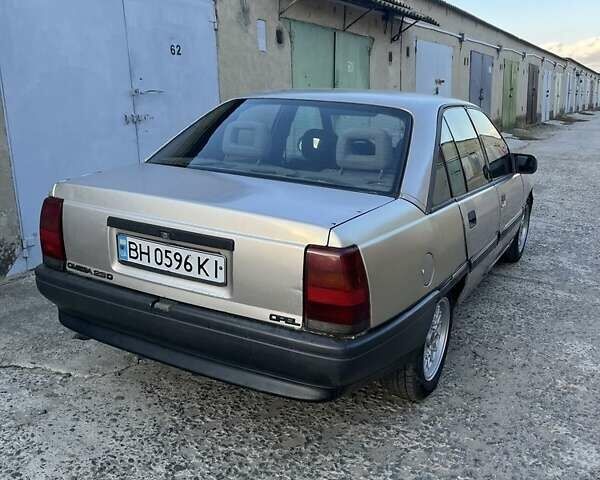 Бежевый Опель Омега, объемом двигателя 2.3 л и пробегом 396 тыс. км за 1500 $, фото 2 на Automoto.ua