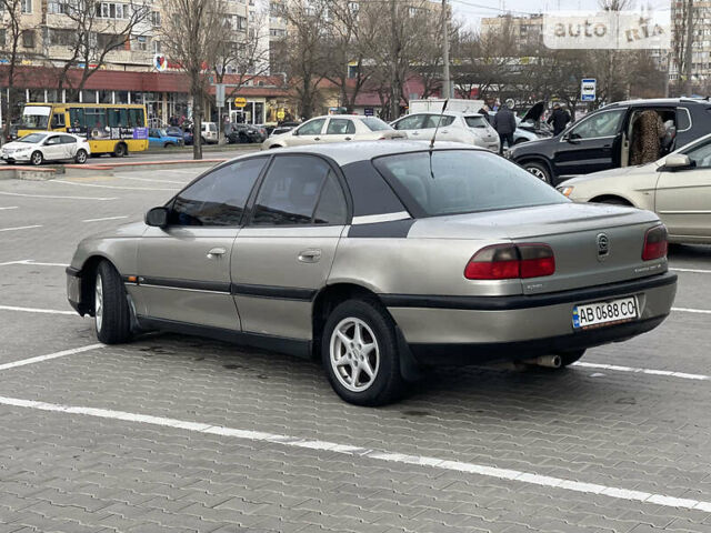 Бежевый Опель Омега, объемом двигателя 2.5 л и пробегом 238 тыс. км за 1300 $, фото 2 на Automoto.ua