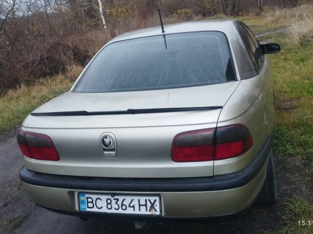 Бежевий Опель Омега, об'ємом двигуна 2 л та пробігом 362 тис. км за 2450 $, фото 15 на Automoto.ua