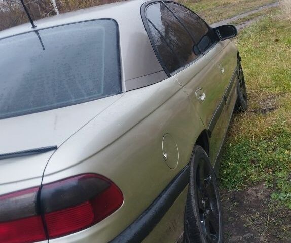 Бежевий Опель Омега, об'ємом двигуна 2 л та пробігом 362 тис. км за 2450 $, фото 14 на Automoto.ua