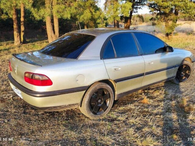 Бежевий Опель Омега, об'ємом двигуна 2 л та пробігом 362 тис. км за 2450 $, фото 5 на Automoto.ua