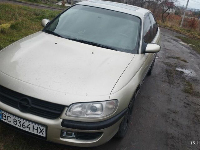 Бежевий Опель Омега, об'ємом двигуна 2 л та пробігом 362 тис. км за 2450 $, фото 23 на Automoto.ua