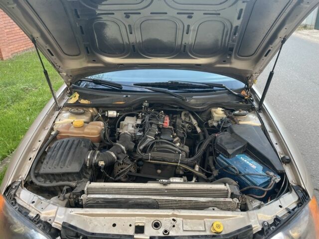 Бежевый Опель Омега, объемом двигателя 2 л и пробегом 300 тыс. км за 2500 $, фото 13 на Automoto.ua