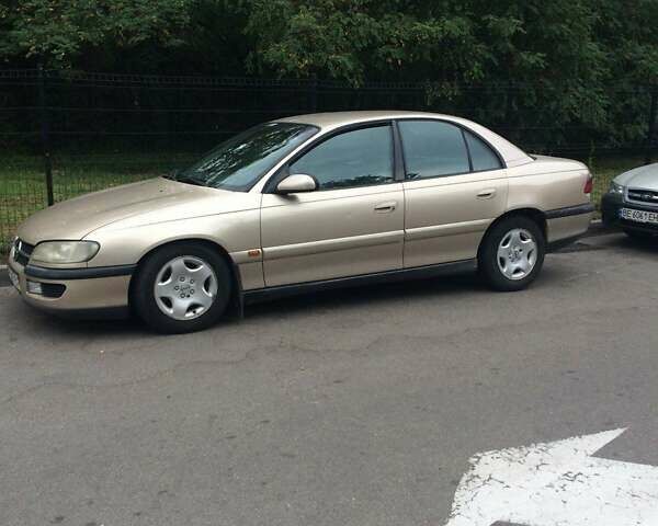 Бежевый Опель Омега, объемом двигателя 2.5 л и пробегом 260 тыс. км за 1700 $, фото 3 на Automoto.ua