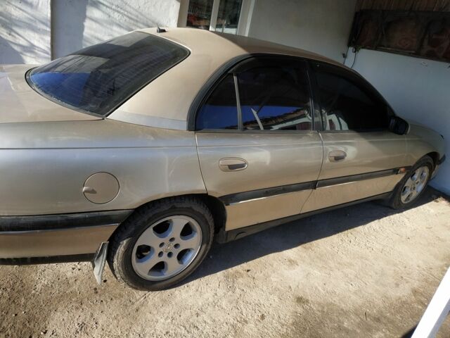 Бежевый Опель Омега, объемом двигателя 2 л и пробегом 500 тыс. км за 2800 $, фото 9 на Automoto.ua