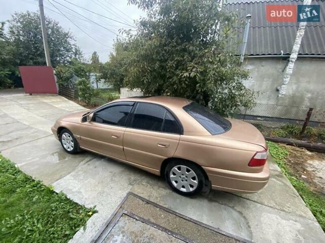 Бежевий Опель Омега, об'ємом двигуна 2.2 л та пробігом 366 тис. км за 3500 $, фото 4 на Automoto.ua