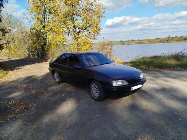 Черный Опель Омега, объемом двигателя 2 л и пробегом 394 тыс. км за 900 $, фото 1 на Automoto.ua