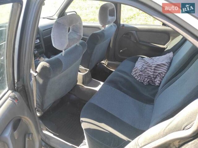 Чорний Опель Омега, об'ємом двигуна 2 л та пробігом 40 тис. км за 1100 $, фото 9 на Automoto.ua