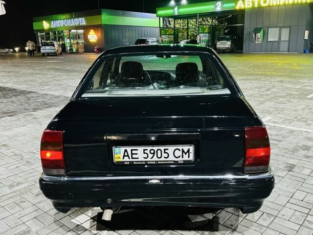 Черный Опель Омега, объемом двигателя 2 л и пробегом 290 тыс. км за 746 $, фото 5 на Automoto.ua