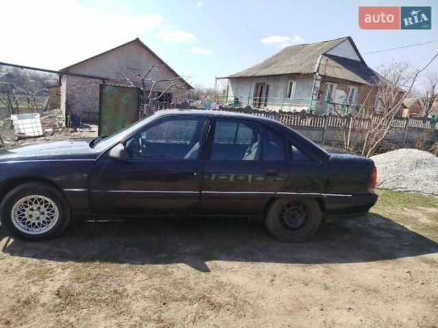 Черный Опель Омега, объемом двигателя 2 л и пробегом 300 тыс. км за 718 $, фото 1 на Automoto.ua