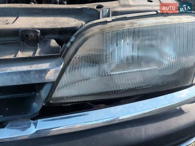 Черный Опель Омега, объемом двигателя 2.6 л и пробегом 250 тыс. км за 471 $, фото 12 на Automoto.ua