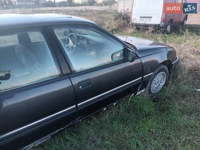 Черный Опель Омега, объемом двигателя 2.6 л и пробегом 250 тыс. км за 471 $, фото 5 на Automoto.ua