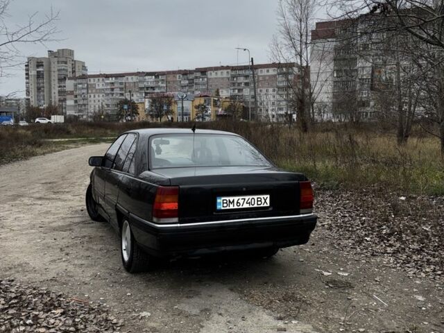 Чорний Опель Омега, об'ємом двигуна 2 л та пробігом 350 тис. км за 1200 $, фото 1 на Automoto.ua