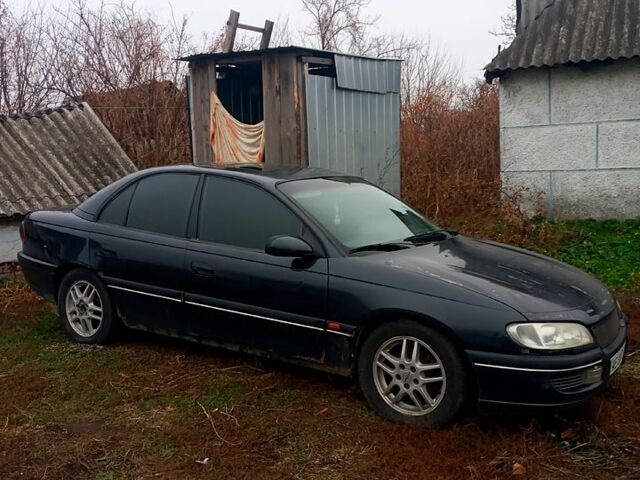 Черный Опель Омега, объемом двигателя 2.5 л и пробегом 330 тыс. км за 1300 $, фото 2 на Automoto.ua
