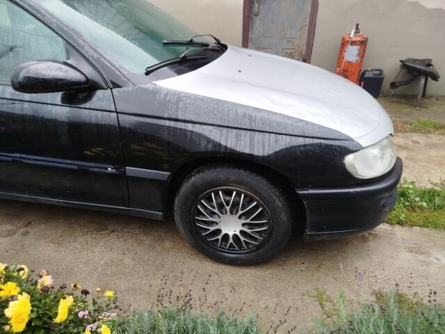 Чорний Опель Омега, об'ємом двигуна 2 л та пробігом 300 тис. км за 950 $, фото 5 на Automoto.ua