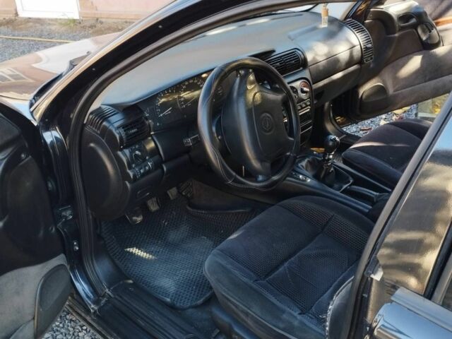 Чорний Опель Омега, об'ємом двигуна 3 л та пробігом 389 тис. км за 2500 $, фото 1 на Automoto.ua