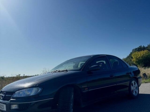 Опель Омега 1994 в Червонограде на Automoto.ua Черный Опель Омега, объемом двигателя 2.5 л и пробегом 450 тыс. км за 2000 $, фото 2 на Automoto.ua