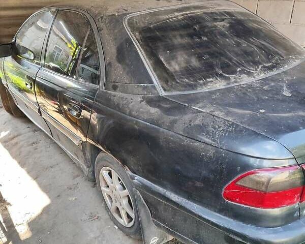 Черный Опель Омега, объемом двигателя 2.5 л и пробегом 999 тыс. км за 850 $, фото 10 на Automoto.ua