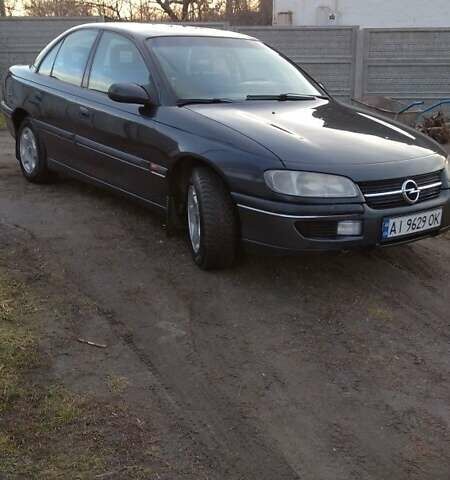 Черный Опель Омега, объемом двигателя 2.5 л и пробегом 300 тыс. км за 2900 $, фото 8 на Automoto.ua